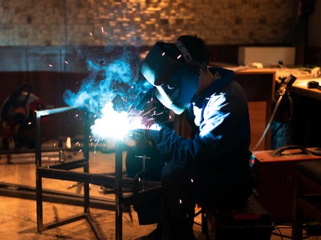 man with mask welding metal atelier 23 2149025925